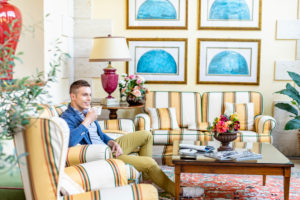 Man enjoying cup of coffee in hotel lobby Man enjoying cup of coffee in hotel lobby